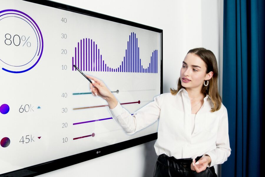 Woman looking at data on a screen
